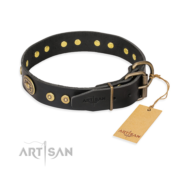 Leather dog collar made of flexible material with rust resistant decorations