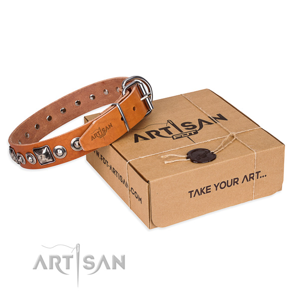 Genuine leather dog collar made of gentle to touch material with rust-proof buckle